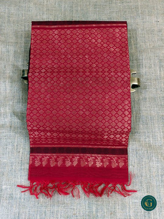 Kora Silk Cotton Saree in a rich dark green hue, featuring a traditional Vairoosi pattern that adds texture and heritage charm.