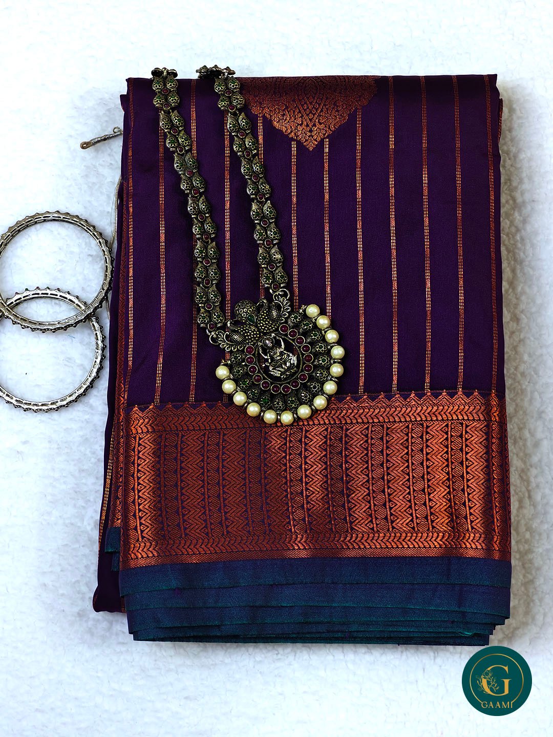 Semi Soft Silk in Violet Colour with Copper Border and Zari Work