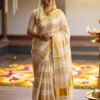 Kerala Tissue Saree with Kasavu Border and Golden Broad Stripes